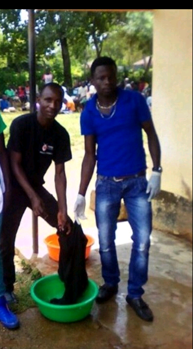 Am the one in blue t_shirt we were cleaning the environment